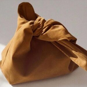 Elegant Tan Knot Merit Bag